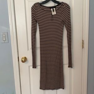 Long sleeved body con dress